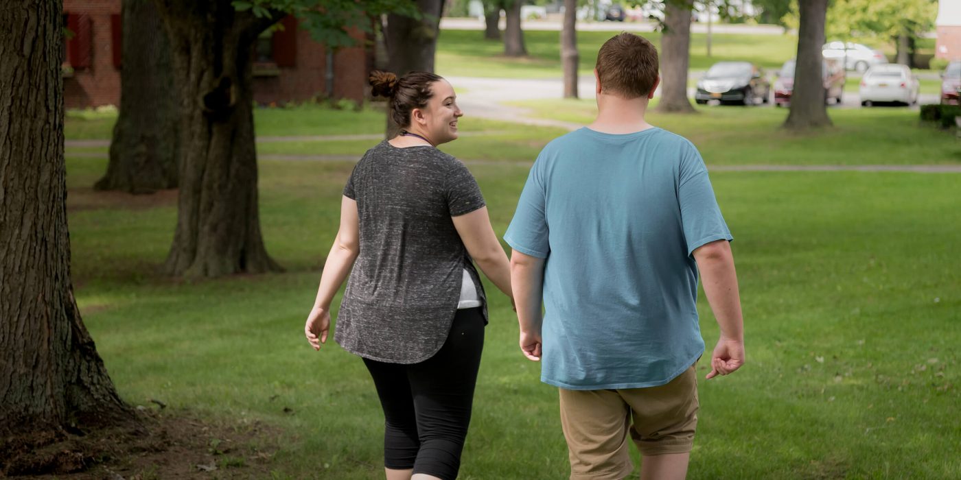 Two students walking outside