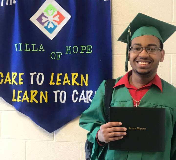 Jeff with his high school diploma